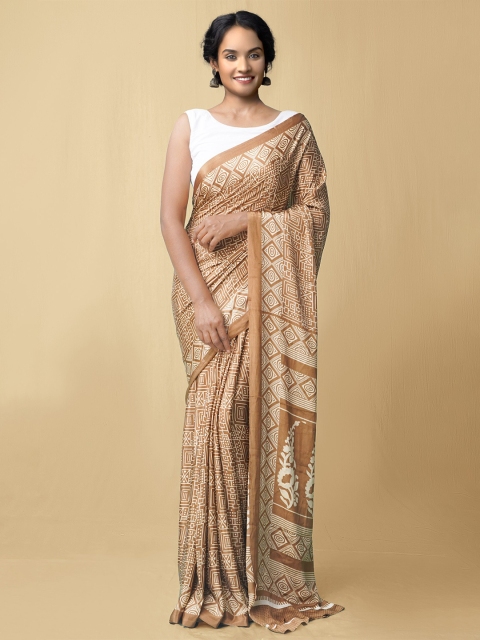 

Unnati Silks Women Brown & White Printed Crepe Art Silk Saree