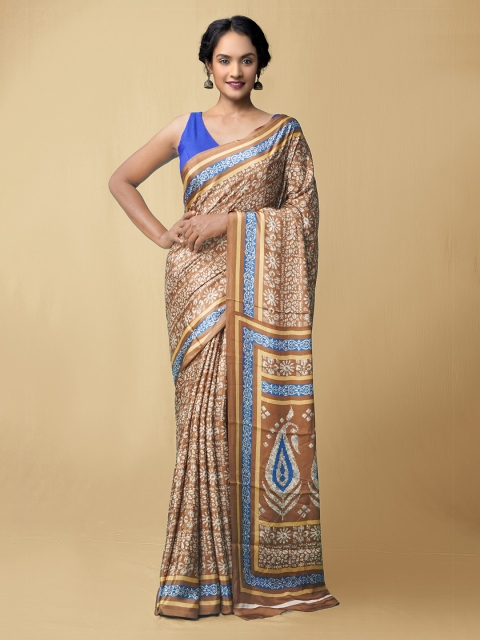 

Unnati Silks Women Brown & Blue Printed Crepe Art Silk Saree
