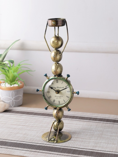 

Aapno Rajasthan Gold-Toned & Blue Abstract Shaped Vintage Table Clock