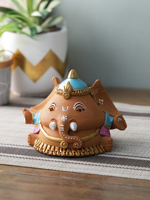 

Aapno Rajasthan Brown & Blue Ganesha Idol Showpiece