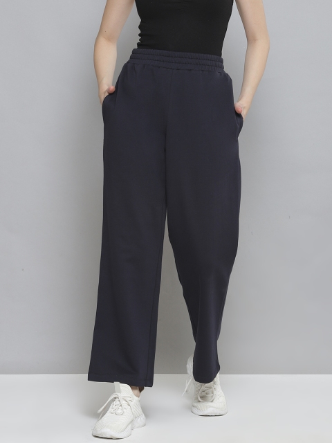 

Femella Women Navy Blue Solid Straight Fit Fleece Track Pants