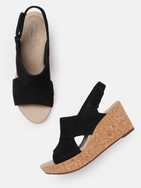 

Clarks Black Snakeskin Leather Wedges