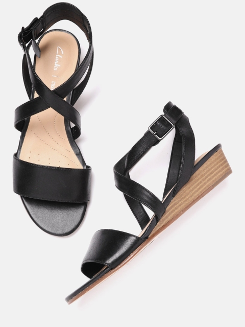

Clarks Black Solid Leather Wedges