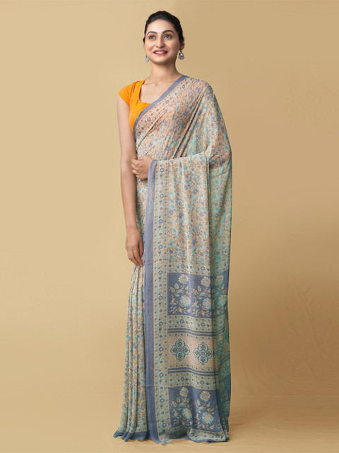 

Unnati Silks Cream-Coloured & Turquoise Blue Floral Art Silk Block Print Saree