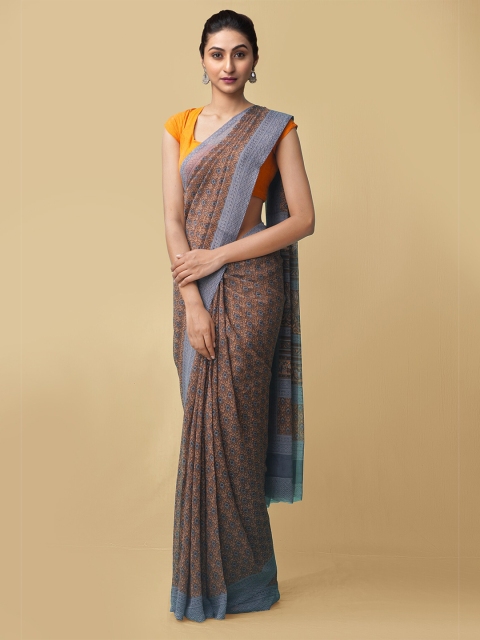 

Unnati Silks Women Tan & Blue Printed Georgette Saree