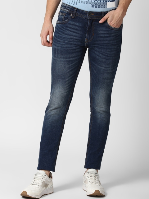 

Peter England Casuals Men Navy Blue Tapered Fit Heavy Fade Jeans