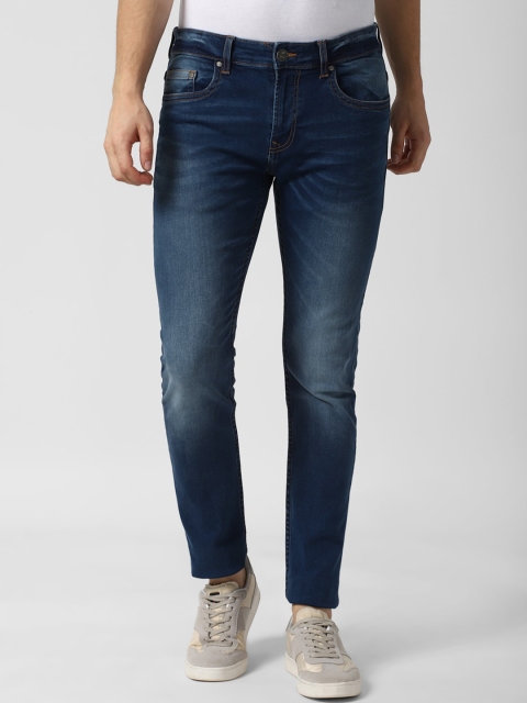 

Peter England Casuals Men Navy Blue Tapered Fit Heavy Fade Jeans