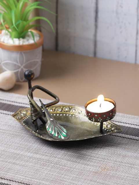 

Aapno Rajasthan Brown Man In A Boat Candle Holder