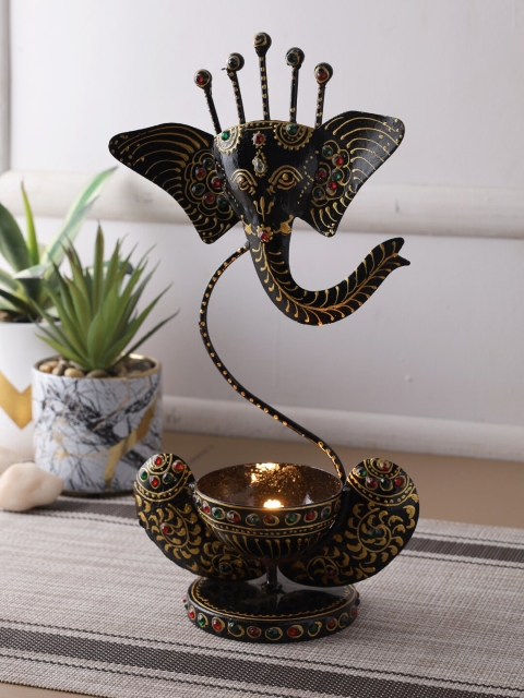 

Aapno Rajasthan Black & Gold-Toned Lord Ganesha Tealight Holder