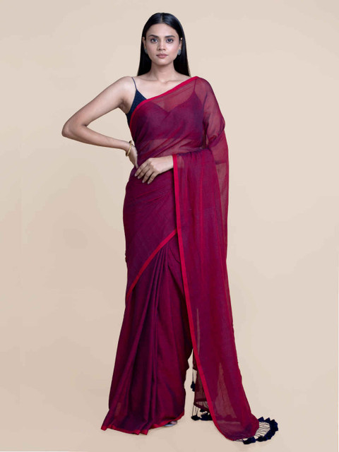 

Suta Maroon Solid Tassel Mul Cotton Saree