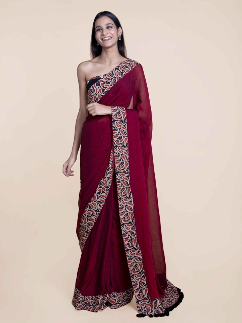 

Suta Maroon & Black Solid Pure Cotton Saree