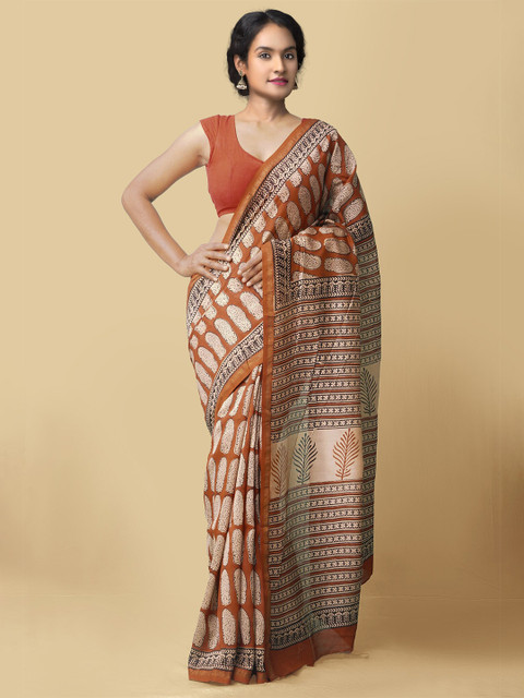 

Unnati Silks Red & Beige Ethnic Motifs Silk Cotton Chanderi Saree