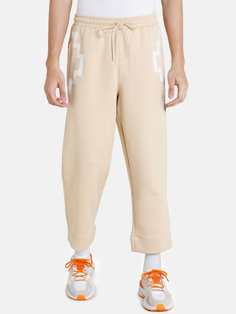 

Puma x PRONOUNCE Men Cream Solid Regular Fit Loose Pants