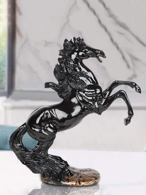 

THE ARTMENT Black & Bronze-Toned Leaping Horse Showpiece