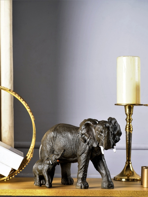 

THE ARTMENT Black Rustic Tuskless Pair of Elephants Showpiece