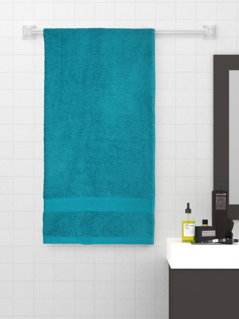 

Raymond Home Turquoise Blue Solid 450 GSM Bath Towel