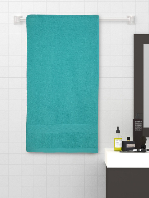 

Raymond Home Blue Solid Absorbent Premium Grade Cotton 300 GSM Bath Towel