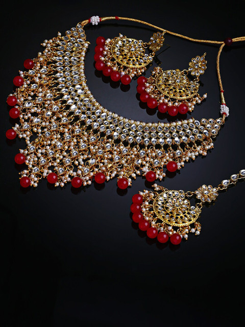 

Shining Diva Red & Gold Toned Gold Plated & Beaded Jwellery Set