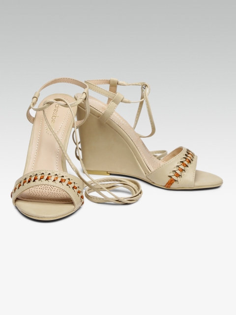 

DressBerry Women Beige Wedges