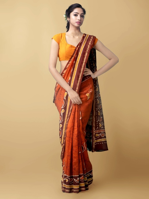 

Unnati Silks Orange & Brown Ethnic Motifs Zari Silk Cotton Chanderi Saree