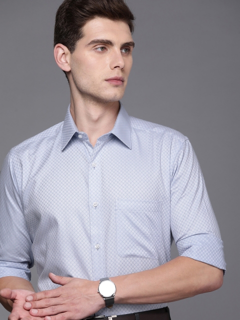 

Raymond Men Blue & White Printed Slim Fit Foraml Shirt