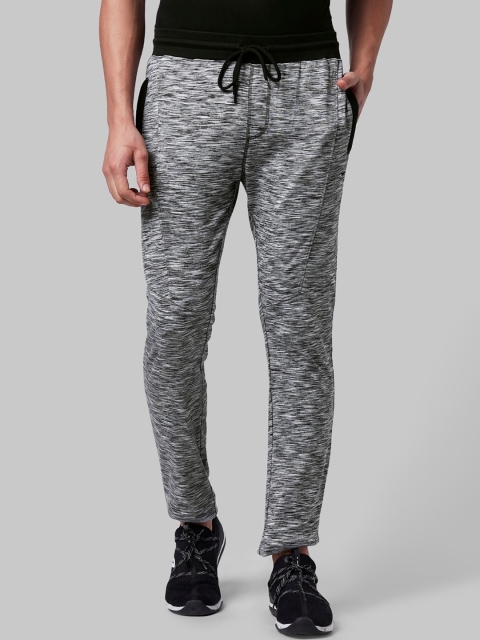 

Park Avenue Men Black & Grey Patterned Track Pants