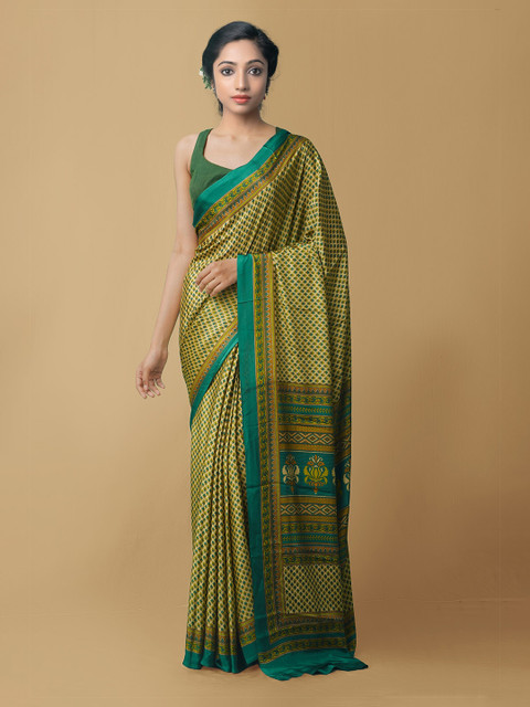 

Unnati Silks Brown & Green Ethnic Motifs Crepe Saree