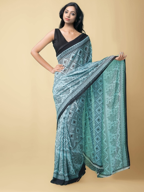 

Unnati Silks Women Blue Printed Georgette Saree