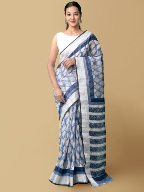 

Unnati Silks Blue & White Block Print Ethnic Motifs Zari Pure Linen Jamdani Saree