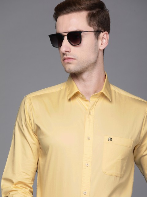 

Raymond Men Yellow Solid Slim Fit Semiformal Shirt