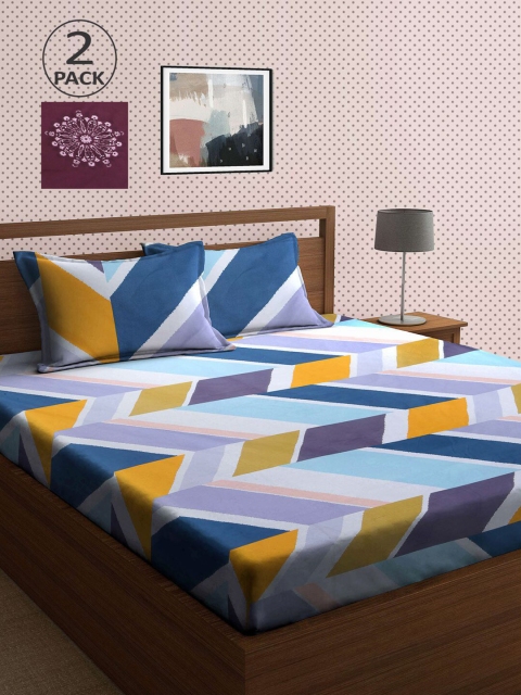 

KLOTTHE Blue & Mauve Geometric 210 TC 2 King Bedsheet with 4 Pillow Covers