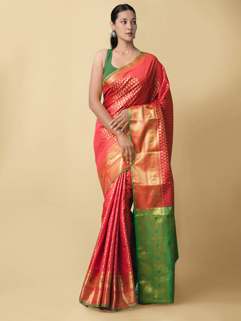 

Unnati Silks Orange & Green Ethnic Motifs Zari Silk Blend Kanjeevaram Saree