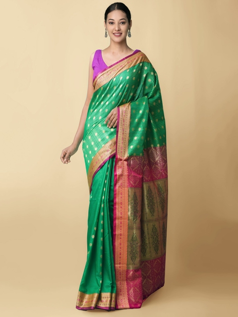 

Unnati Silks Green & Pink Ethnic Motifs Zari Silk Blend Kanjeevaram Saree