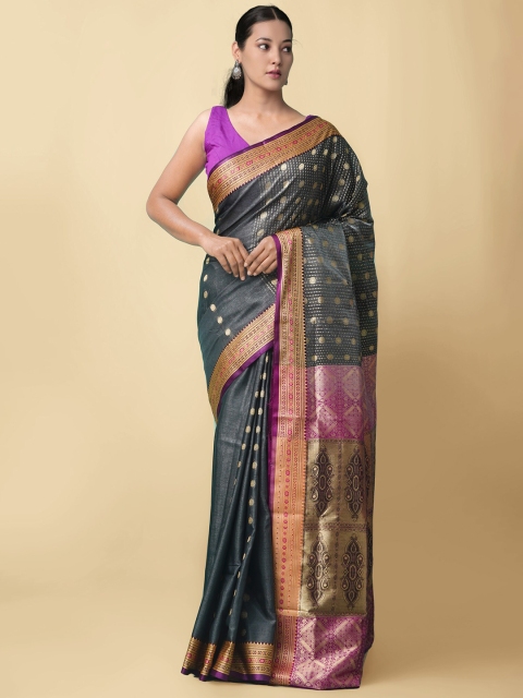 

Unnati Silks Black & Magenta Ethnic Motifs Zari Silk Blend Kanjeevaram Saree