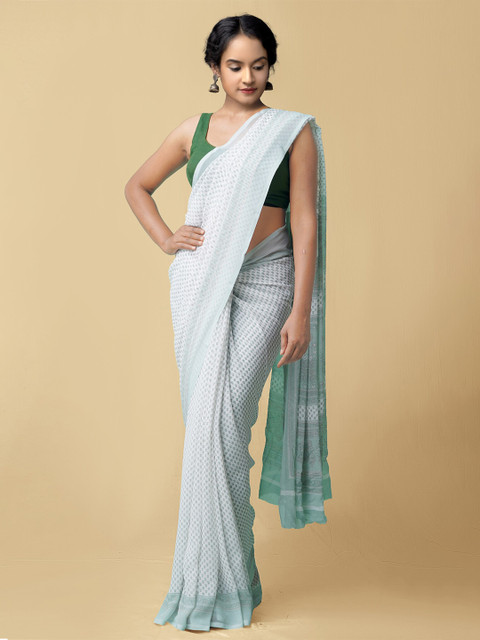 

Unnati Silks White & Grey Floral Patola Saree