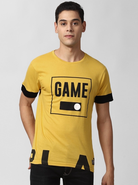 

Peter England Casuals Men Yellow Printed Pure Cotton T-shirt
