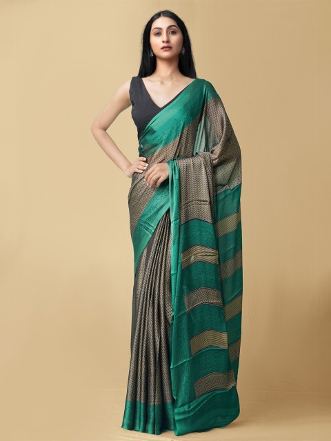 

Unnati Silks Green & Beige Floral Patola Saree
