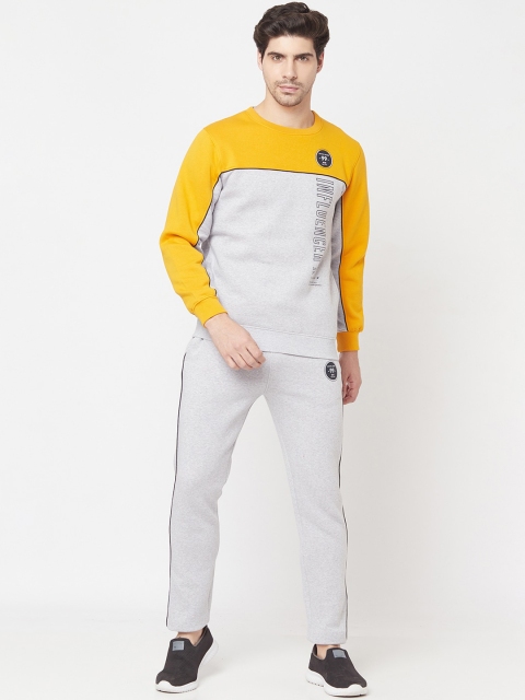 

Octave Men Yellow & Grey Melange Colourblocked Tracksuits