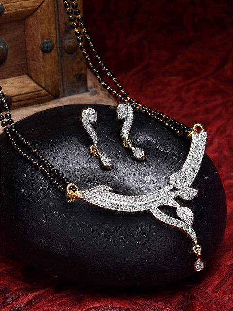 

ZENEME Black Gold-Plated Stone-Studded Leaf Shaped Mangalsutra & Earrings Set, White