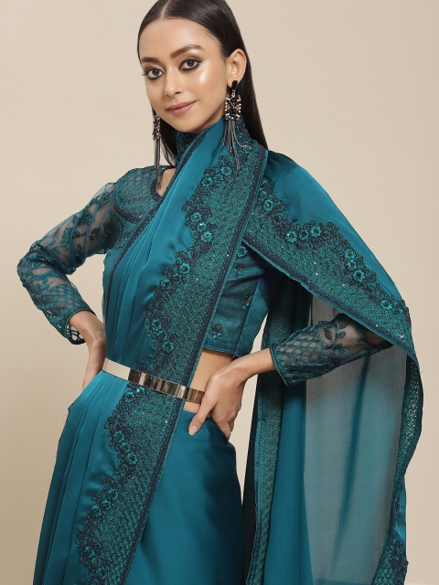 

Mitera Teal Green Sequinned Pure Silk Fusion Saree