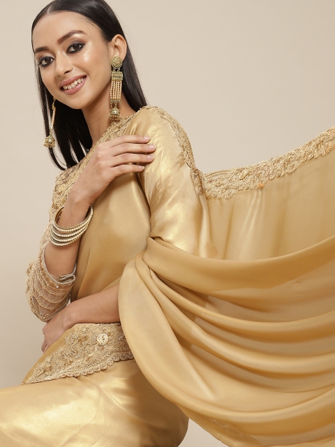 

Mitera Beige Solid Saree