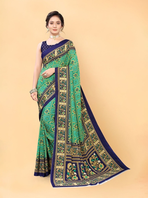 

Viva N Diva Blue & Green Printed Georgette Saree