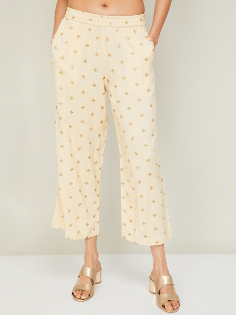 

Melange by Lifestyle Women Beige & Gold-Toned Ethnic Motifs Printed Knitted Cropped Ethnic Palazzos