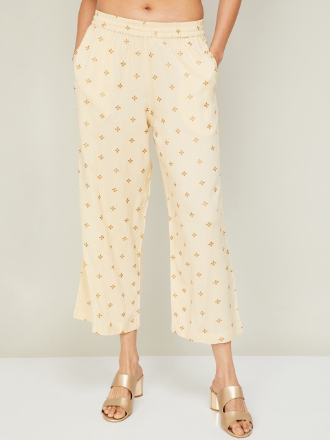 

Melange by Lifestyle Women Beige Ethnic Motifs Printed Flared Palazzos