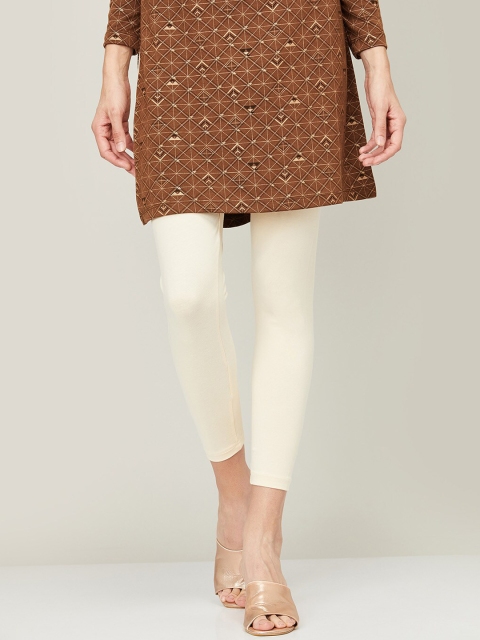 

Melange by Lifestyle Women Off-White Solid Cotton Ankle Length Leggings