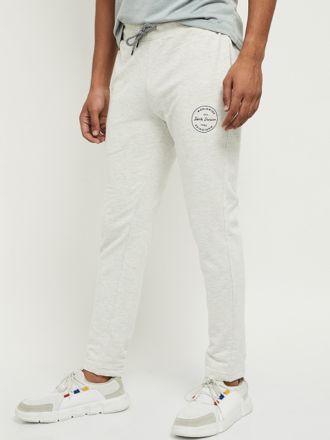 

max Men Off-White Solid Straight Fit Track Pants