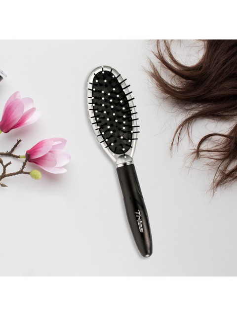 

Trisa Black Rubber Cushion Hair Brush