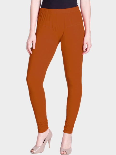 

LYRA Women Dark Rust-Coloured Solid Churidar-Length Leggings