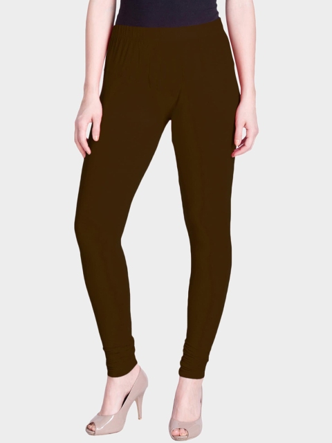 

LYRA Women Coffee Brown Coloured Solid Snug-Fit Churidar Leggings
