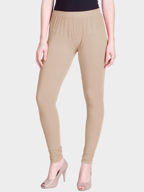 

LYRA Women Beige Solid Churidar-Length Snug-Fit Leggings